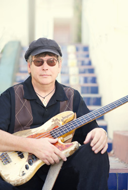 Tommy Shannon with guitar